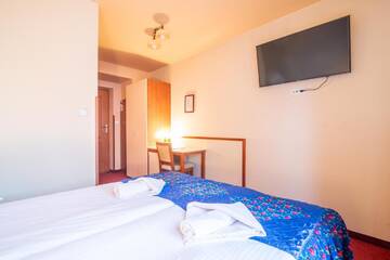 Фото номера Стандартный двухместный номер с 1 кроватью Отель Hotel Nałęcz City Center г. Закопане 3