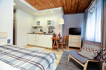 Фото номера Апартаменты с балконом Апартаменты Nosalove Apartamenty г. Закопане 3
