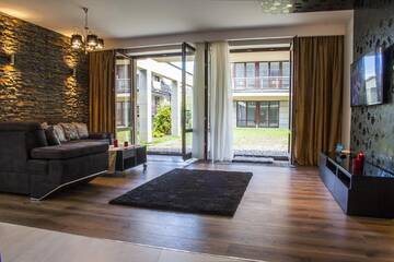 Фото номера Люкс с 3 спальнями Апартаменты Apartamenty Oaza Superior Zakopane г. Закопане 2