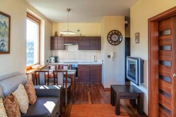Фото номера Апартаменты с балконом Апартаменты Viva Maria Apartament г. Закопане 5