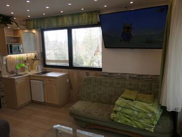 Фото номера Семейный номер 4 Апартаменты Apartamenty u Łukasza г. Закопане 7