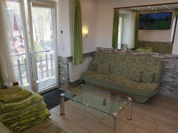 Фото номера Семейный номер 4 Апартаменты Apartamenty u Łukasza г. Закопане 3