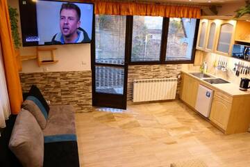 Фото номера Апартаменты с 1 спальней и балконом 5 Апартаменты Apartamenty u Łukasza г. Закопане 7