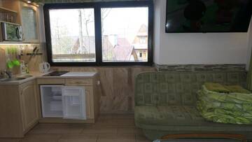 Фото номера Семейный номер 4 Апартаменты Apartamenty u Łukasza г. Закопане 4
