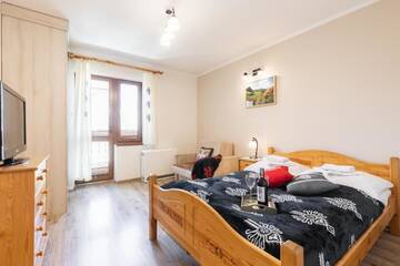 Фото номера Апартаменты с террасой Апартаменты Apartamenty Zakopane Krupówki г. Закопане 5