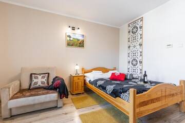 Фото номера Апартаменты с террасой Апартаменты Apartamenty Zakopane Krupówki г. Закопане 3