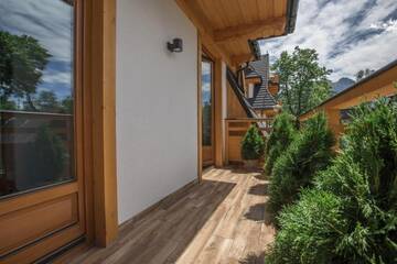 Фото номера Апартаменты с 2 спальнями - Здание B Апартаменты Zakopiańskie Tarasy SPA г. Закопане 39