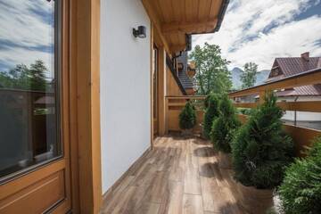 Фото номера Апартаменты с 2 спальнями - Здание B Апартаменты Zakopiańskie Tarasy SPA г. Закопане 45