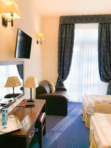 Фото номера Двухместный номер с 1 кроватью Отель Hotel Patria Zakopane г. Закопане 9