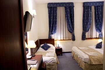 Фото номера Трехместный номер Отель Hotel Patria Zakopane г. Закопане 6