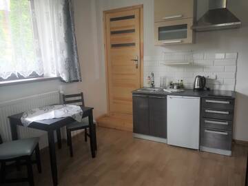 Фото номера Семейный номер-студио Проживание в семье Villa Kucma г. Закопане 12