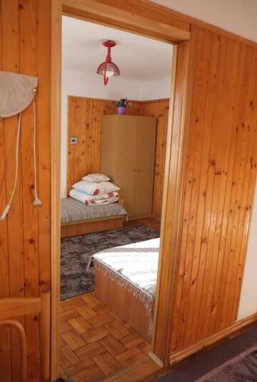 Фото номера Четырехместный номер с видом на горы Проживание в семье Pokoje u Tadeusza г. Закопане 8