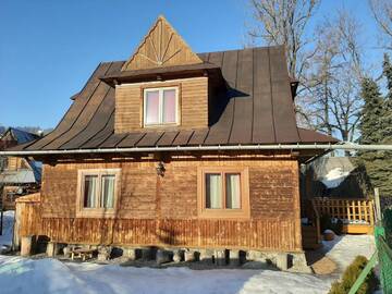 Фото номера Дом с 4 спальнями Шале Domek w Rojach г. Закопане 19