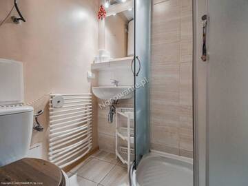 Фото номера Дом с 4 спальнями Шале Domek w Rojach г. Закопане 23