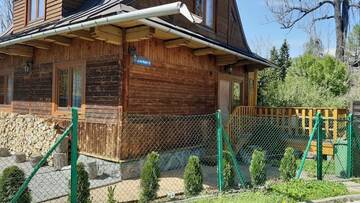 Фото номера Дом с 4 спальнями Шале Domek w Rojach г. Закопане 34