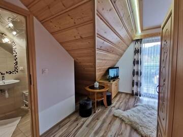Фото номера Двухместный номер с 1 кроватью и балконом Гостевой дом Pokoje Gościnne Kurosik г. Закопане 6