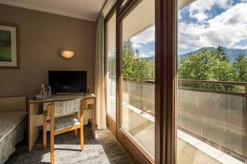 Фото номера Номер-студио (4 взрослых) Курортные отели Geovita Zakopane г. Закопане 6